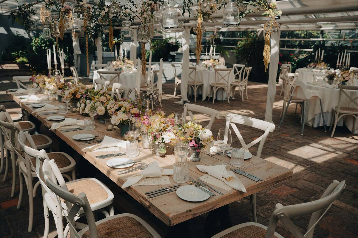 seasonal item wedding decoration idea at a spring lakeside wedding with weather-resistant lanterns and floral arrangements